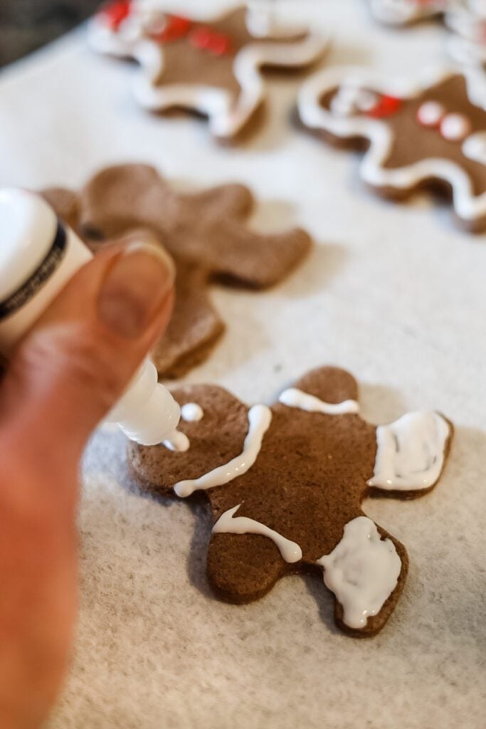 using puffy paint on gingerbread salt dough ornaments
