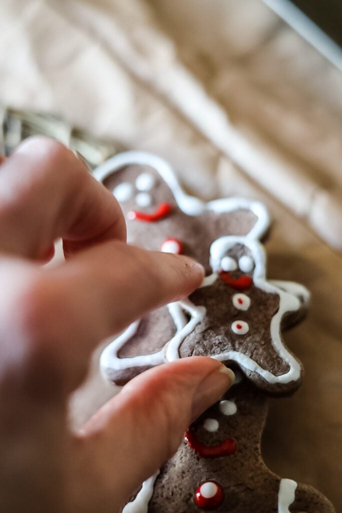 gluing salt dough ornaments onto a wreath