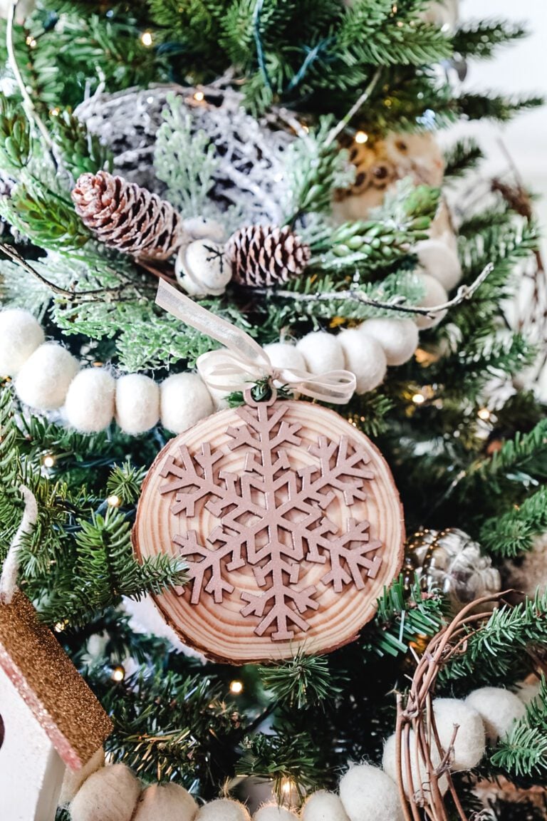 wood slice ornaments with snowflakes