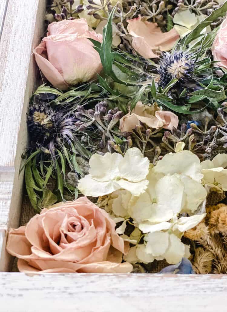 making a shadowbox with flowers