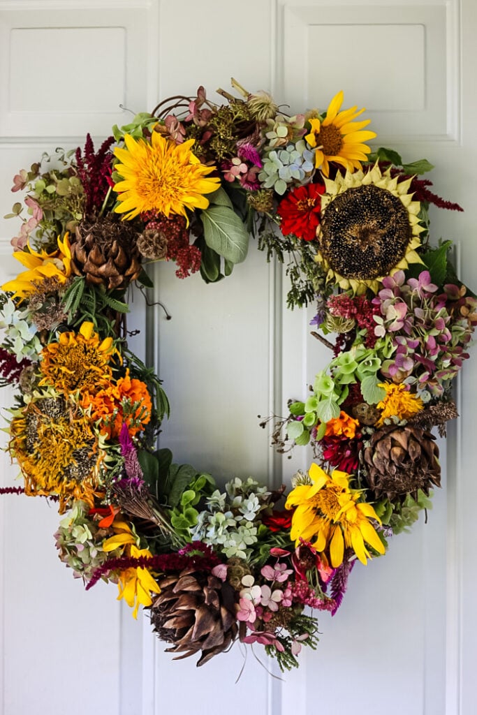diy garden wreath on front door.
