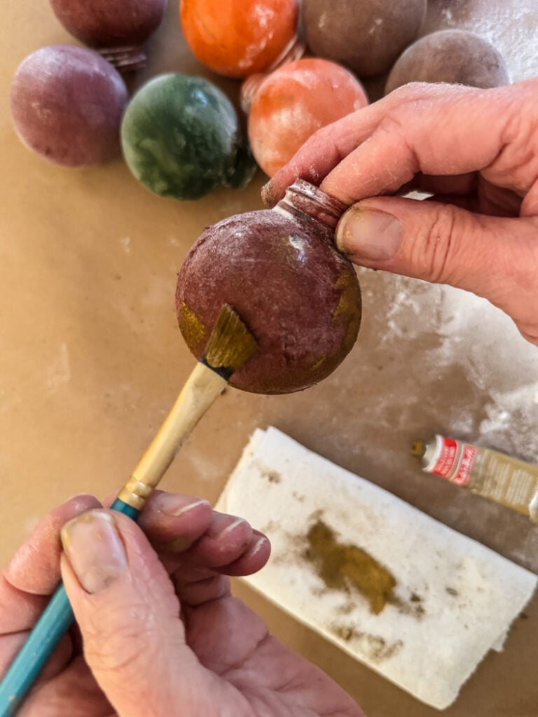 painting an ornament with rub n buff