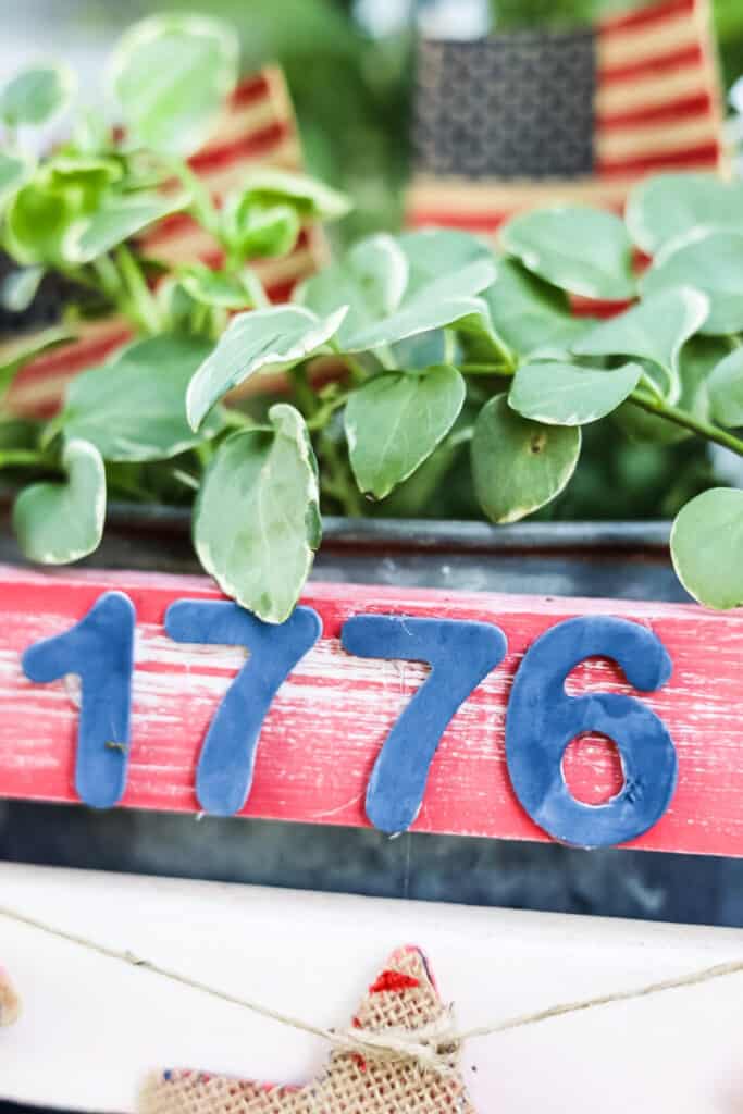 1776 on a patriotic flower planter