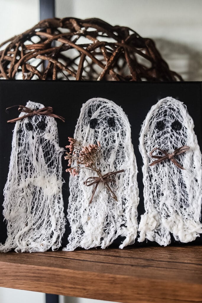 a cute diy canvas of ghosts