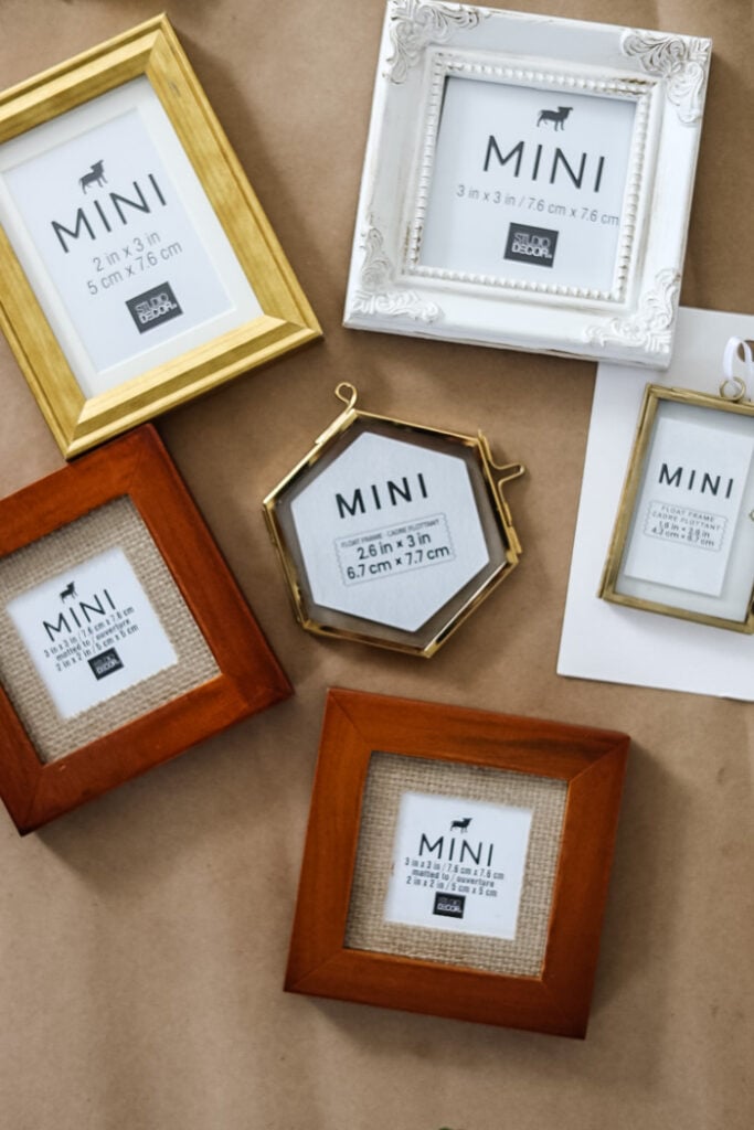 a variety of mini picture frames