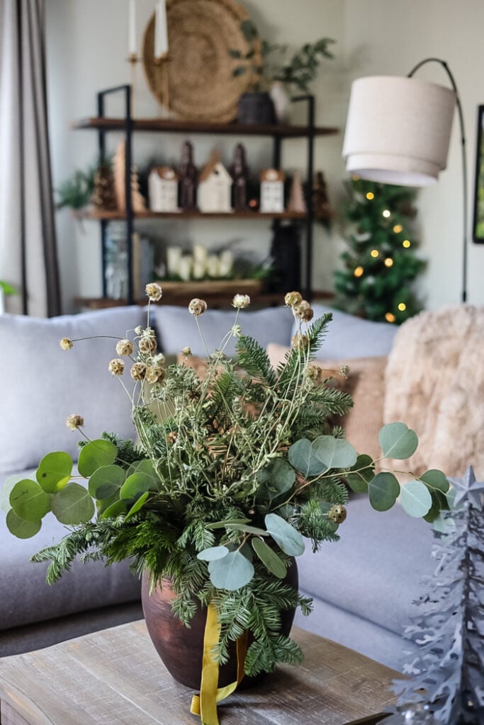 a large winter planter on a coffee table