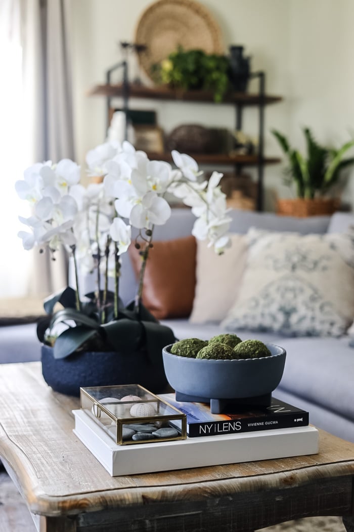a living room that is decorated in pottery barn style