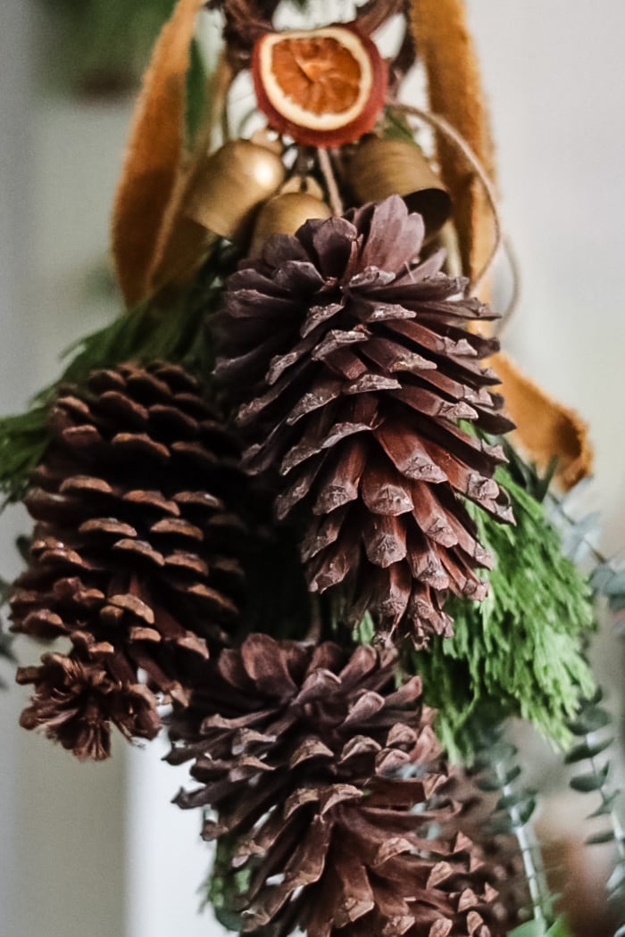 A Touch of Winter: A Pinecone Door Hanger