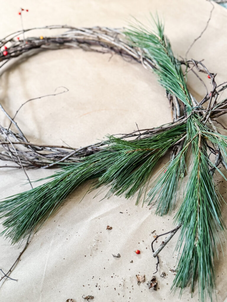 making a wreath with fresh white pine boughs