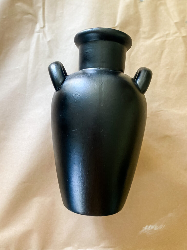 handled vase painted black